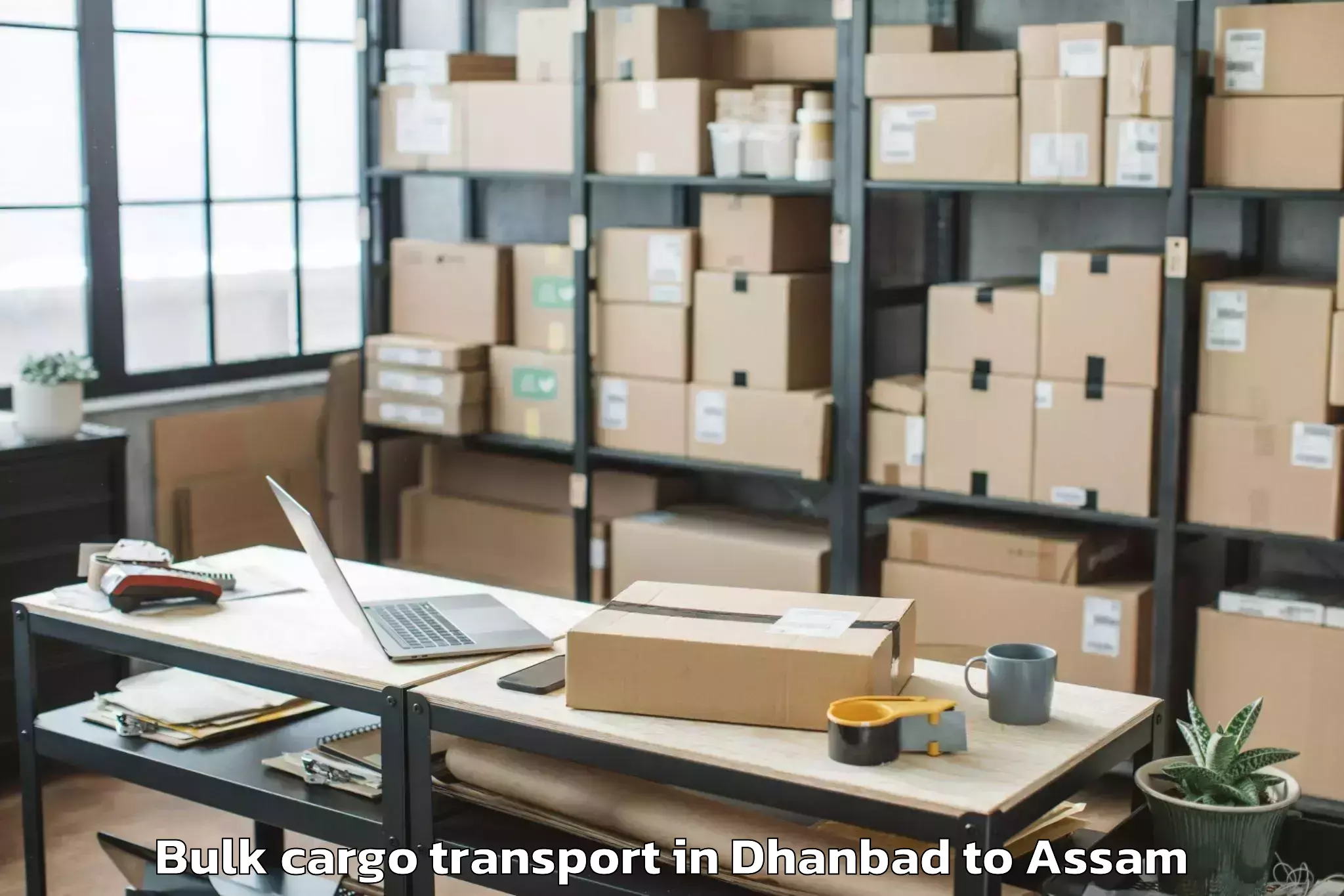 Book Dhanbad to Lumding Bulk Cargo Transport